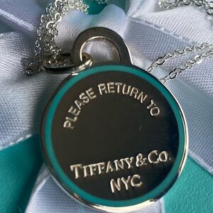 Tiffany & Co. Silver Engraved Round Pendant